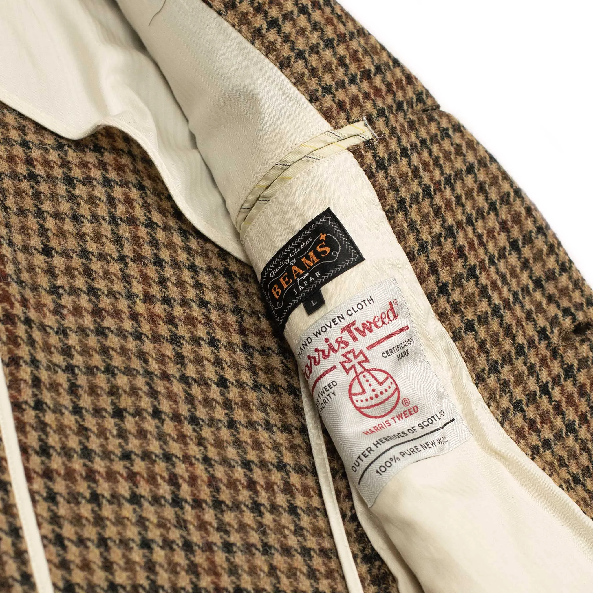 Elbow patch sport coat in brown, black, and burgundy guncheck Harris Tweed wool