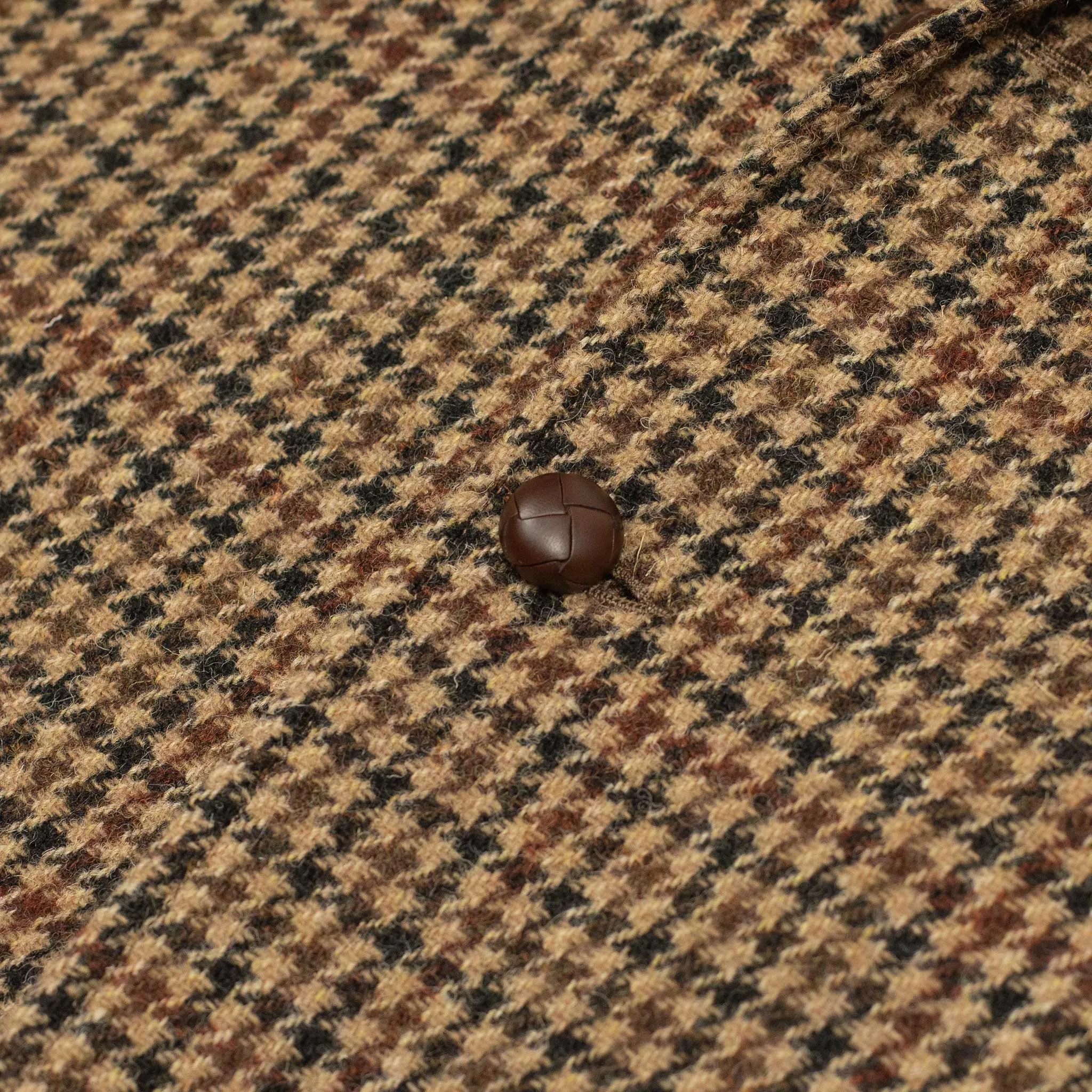 Elbow patch sport coat in brown, black, and burgundy guncheck Harris Tweed wool